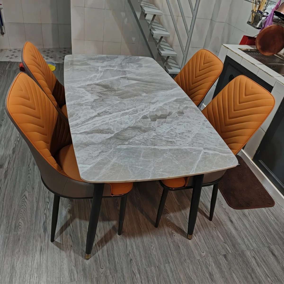 Bàn ăn mặt đá ceramic chân côn 6 ghế Spine